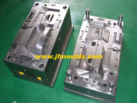 Wire clamping and air marks near the screw holes of the mold